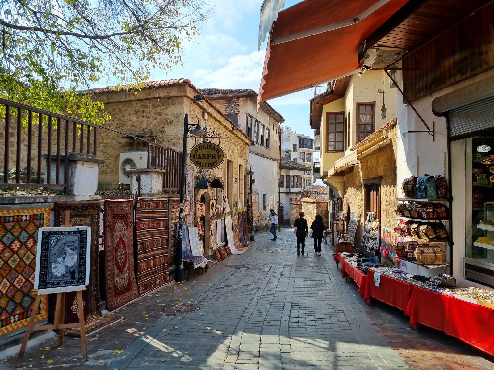 A quiet lane in Kaleiçi old town with carpet and souvenir shops